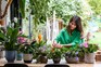 Sarah Gerrard-Jones cleaning leaves of house plants
