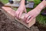 How to edge a lawn with bricks