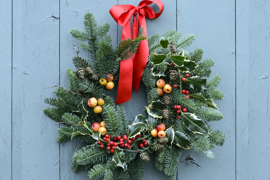 Traditional Christmas wreath using crab apples, berries and evergreens